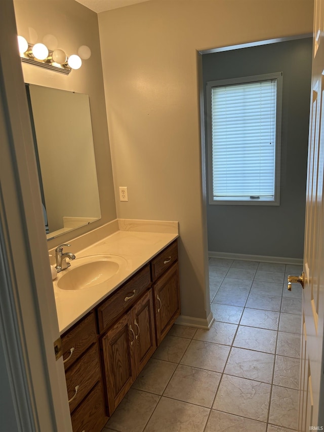 bathroom featuring vanity and tile patterned floors