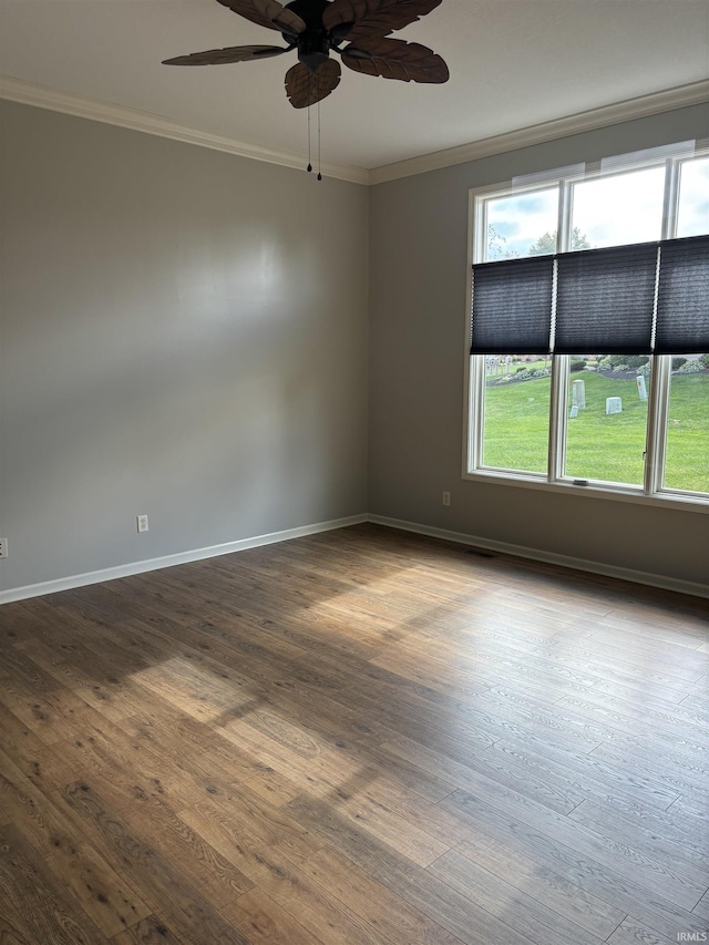 unfurnished room with crown molding, hardwood / wood-style flooring, and ceiling fan