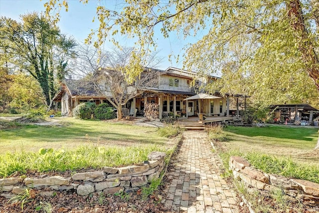 3708 State Ferry Rd, Solsberry, IN 47459 - rear view of house featuring a lawn and a porch