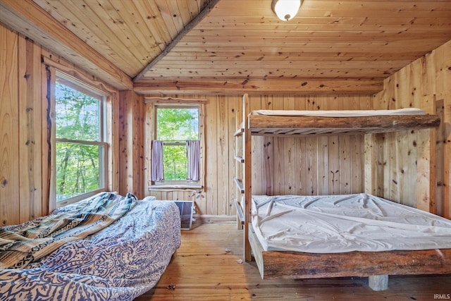 3708 State Ferry Rd, Solsberry, IN 47459 - bedroom with wood ceiling, hardwood / wood-style flooring, lofted ceiling, and wood walls