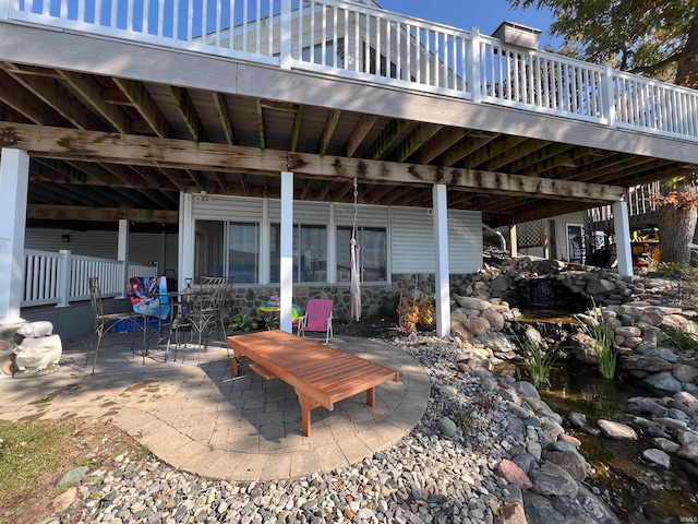 view of patio with a wooden deck