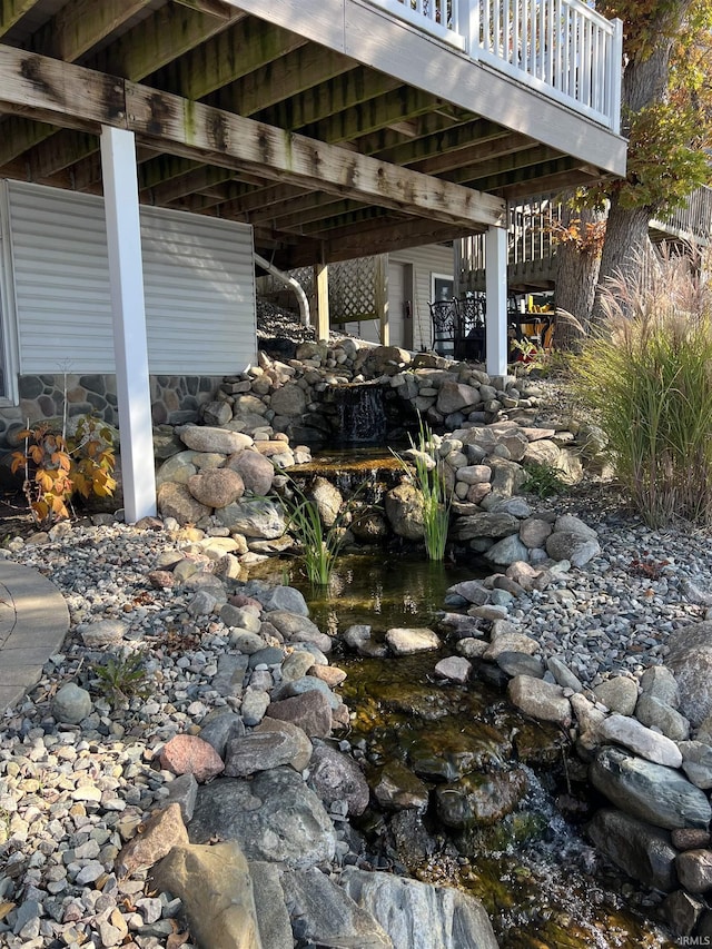 720 Ln 800 Snow Lk, Fremont, IN 46737 - view of patio / terrace with a garden pond