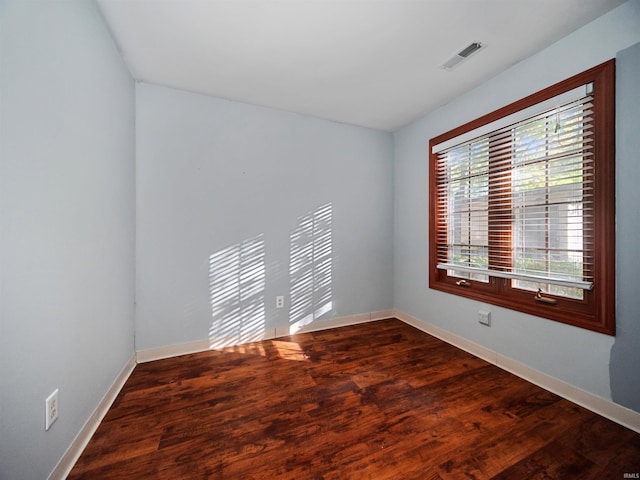 unfurnished room featuring wood-type flooring