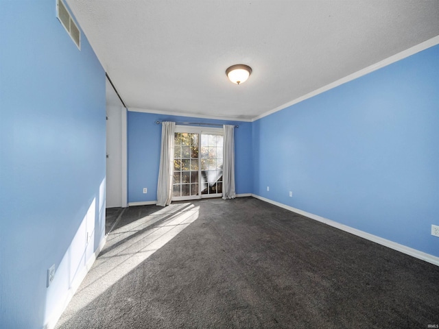 carpeted empty room with crown molding