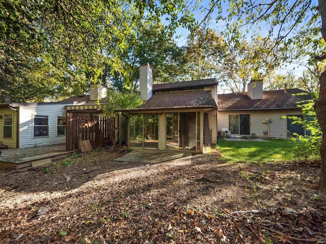 rear view of house featuring a patio area