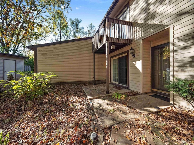 view of property exterior with a balcony