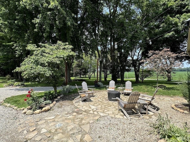 3810 E 100 N, Flora, IN 46929 - view of patio featuring a fire pit