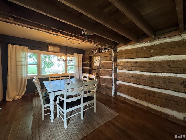 3810 E 100 N, Flora, IN 46929 - dining area featuring wood walls and dark wood-type flooring