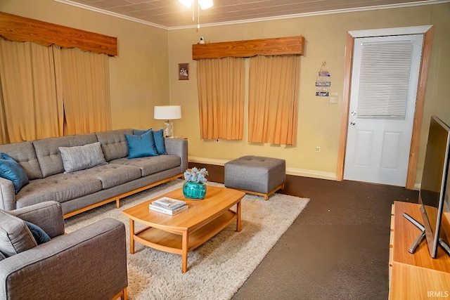 living room with crown molding and ceiling fan