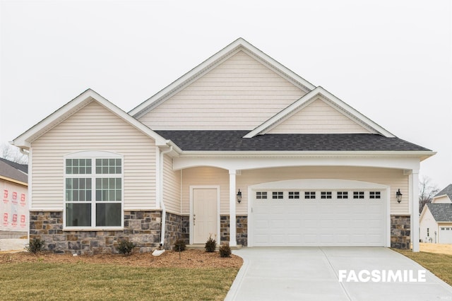 view of front facade featuring a front yard and a garage