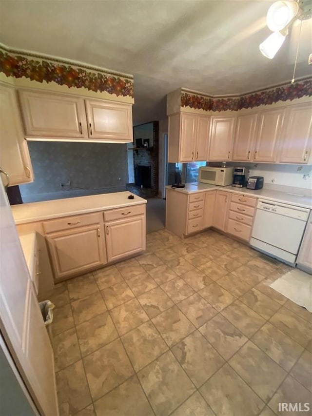 kitchen with ceiling fan and white appliances