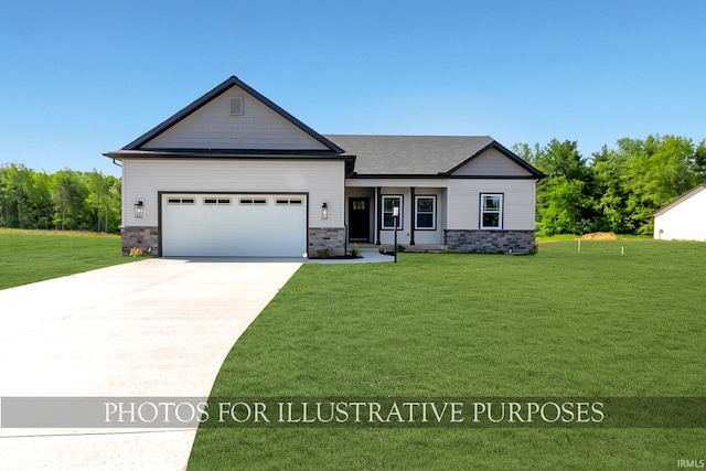 view of front of property with a garage and a front yard