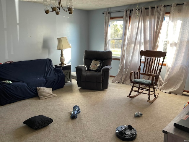 carpeted living room featuring a textured ceiling