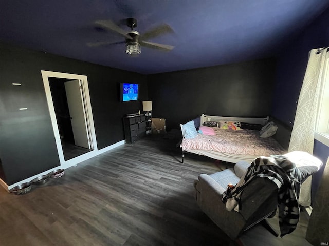 bedroom with hardwood / wood-style floors and ceiling fan