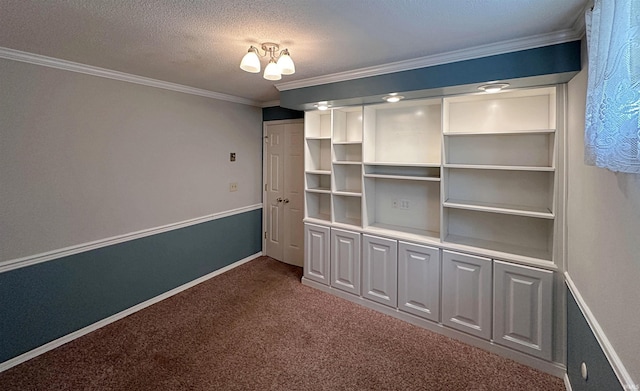 unfurnished bedroom featuring dark carpet, crown molding, and a textured ceiling