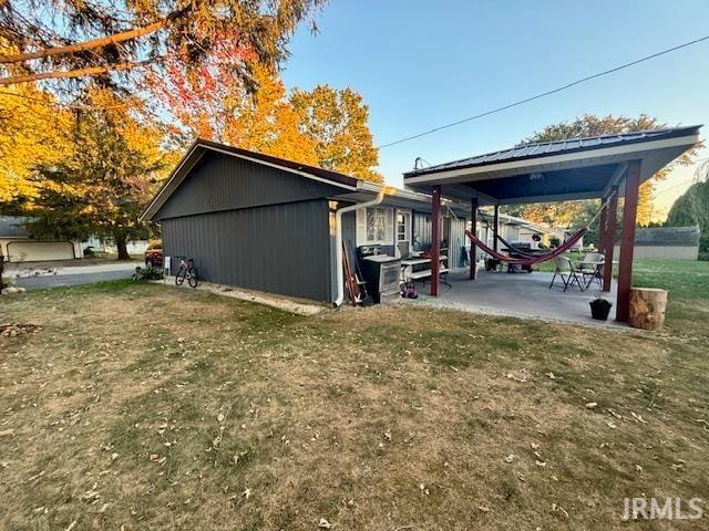 view of property exterior featuring a yard