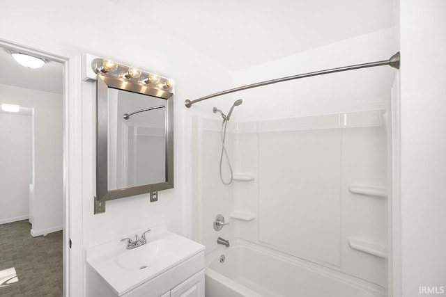 bathroom with vanity and bathtub / shower combination