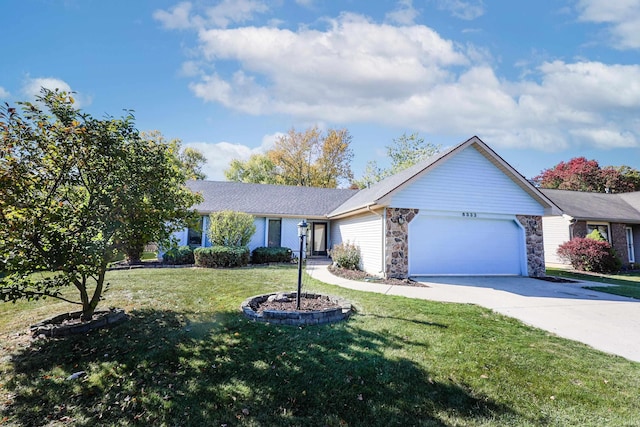 single story home featuring a garage and a front yard