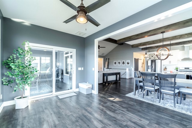 dining space featuring vaulted ceiling with beams, dark wood-type flooring, and ceiling fan with notable chandelier