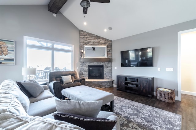 living room featuring beam ceiling, a stone fireplace, dark hardwood / wood-style flooring, and ceiling fan