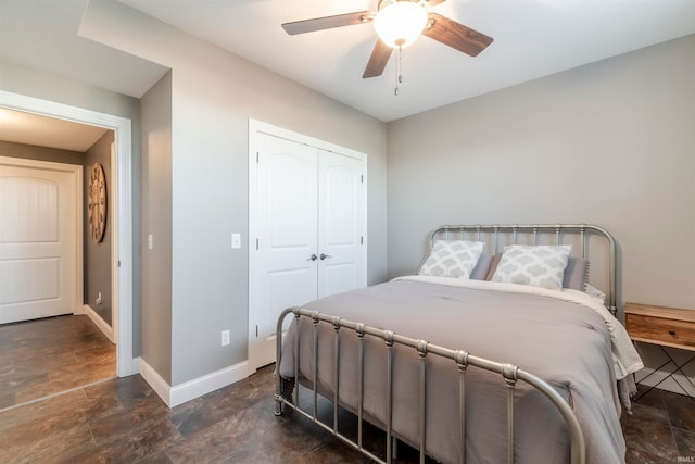 bedroom featuring a closet and ceiling fan