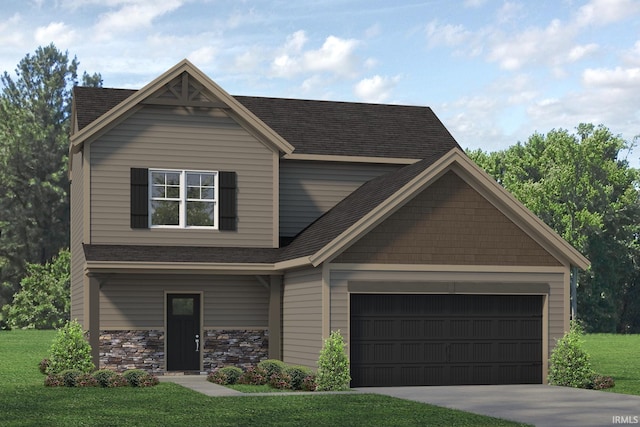 view of front of home with a front yard and a garage