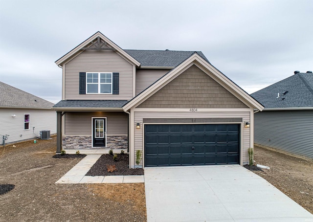 craftsman-style house featuring central AC