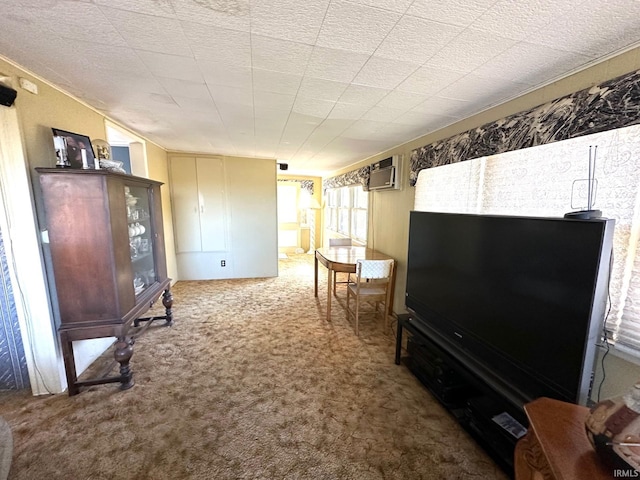 living room featuring an AC wall unit and carpet