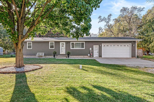 single story home with a front lawn and a garage