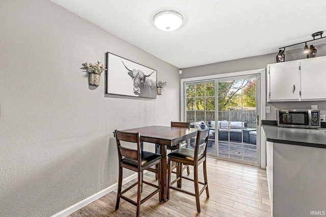 dining area featuring light hardwood / wood-style flooring