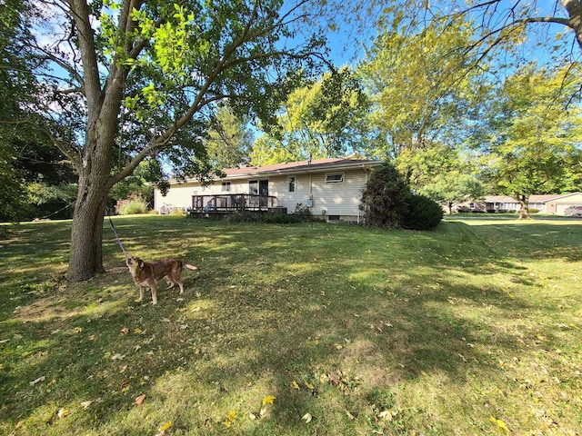 view of yard featuring a deck