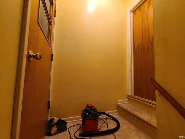 bathroom with tile patterned floors