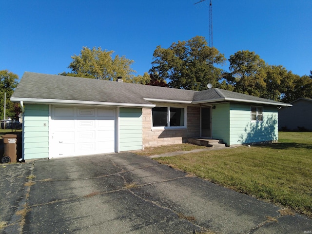 ranch-style house with a front lawn and a garage