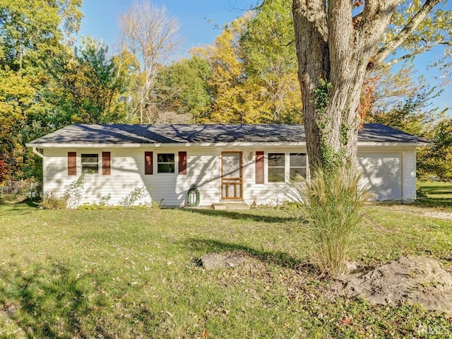 ranch-style home with a front lawn