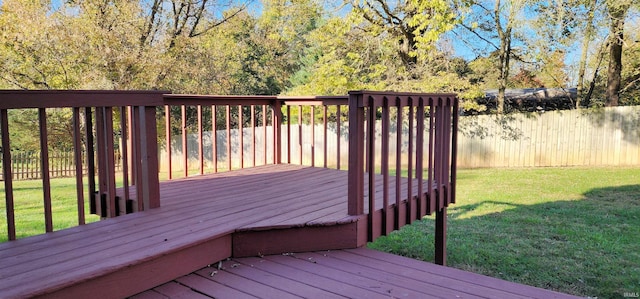 deck featuring a yard