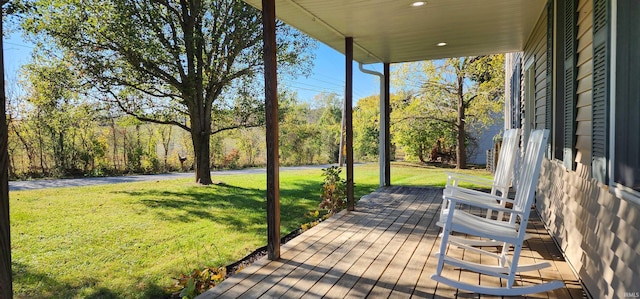 deck featuring a lawn