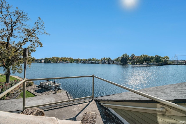 view of dock with a water view