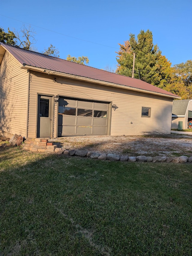 garage with a yard