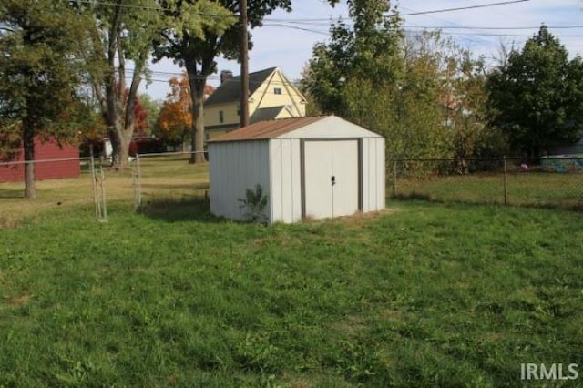 view of outdoor structure with a lawn