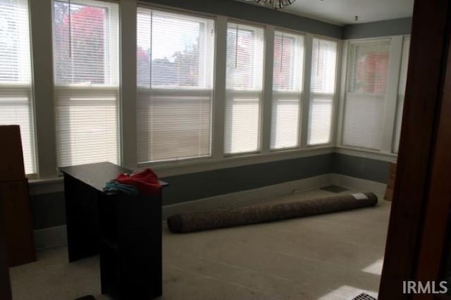 sunroom / solarium with a healthy amount of sunlight