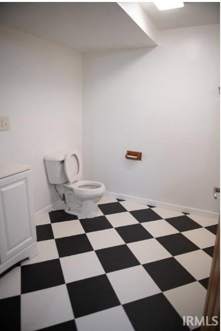 bathroom featuring toilet