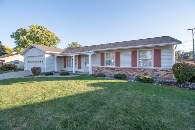 ranch-style home with a front lawn and a garage