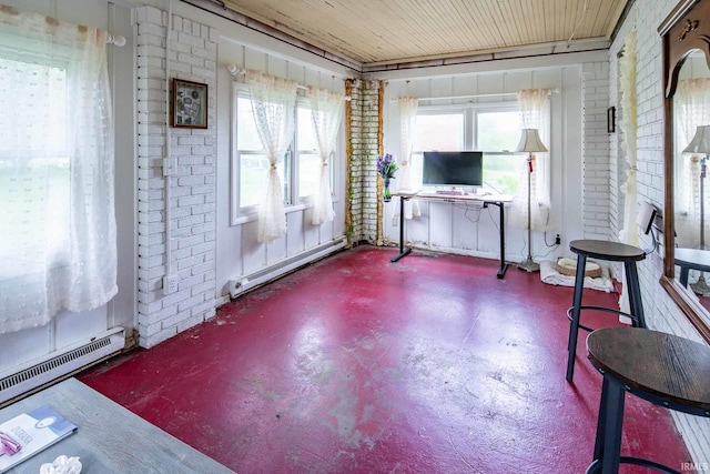 miscellaneous room with a baseboard radiator, brick wall, and wooden ceiling