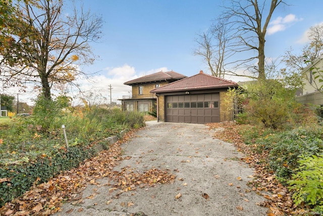 view of property exterior featuring a garage