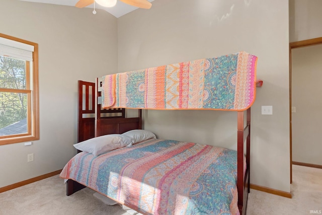 bedroom with light carpet and ceiling fan