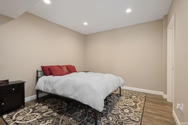 bedroom featuring wood-type flooring