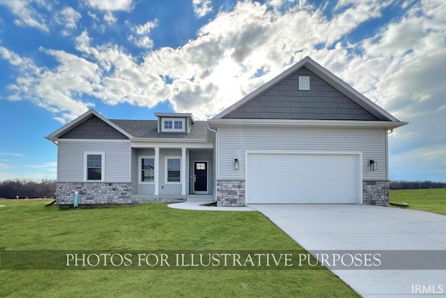 craftsman-style home featuring a front lawn and a garage