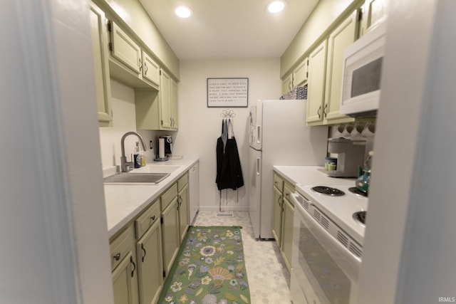 kitchen with sink, light tile patterned floors, and white appliances