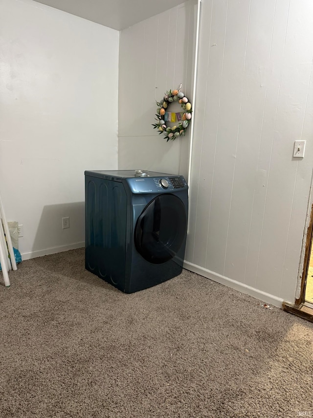 laundry area featuring carpet and washer / clothes dryer