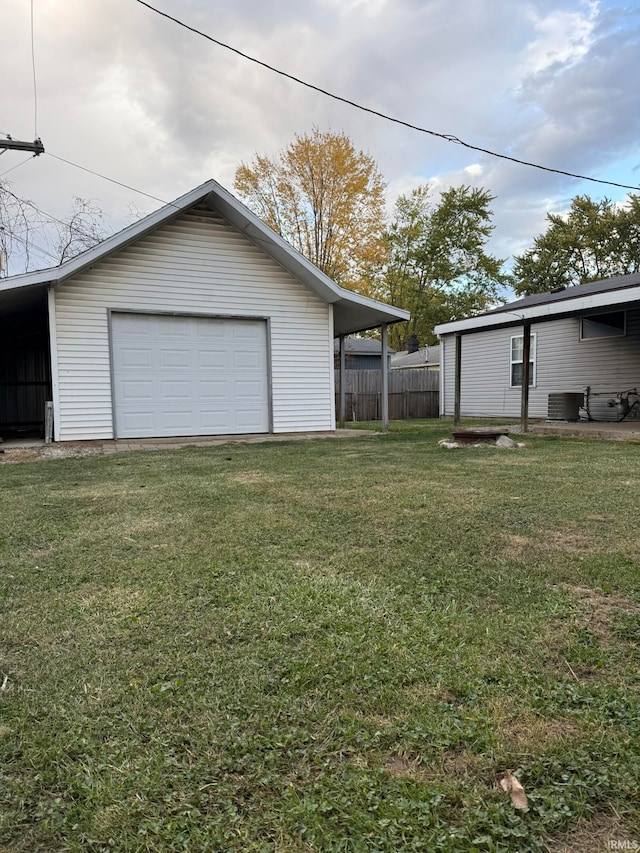 garage with a yard